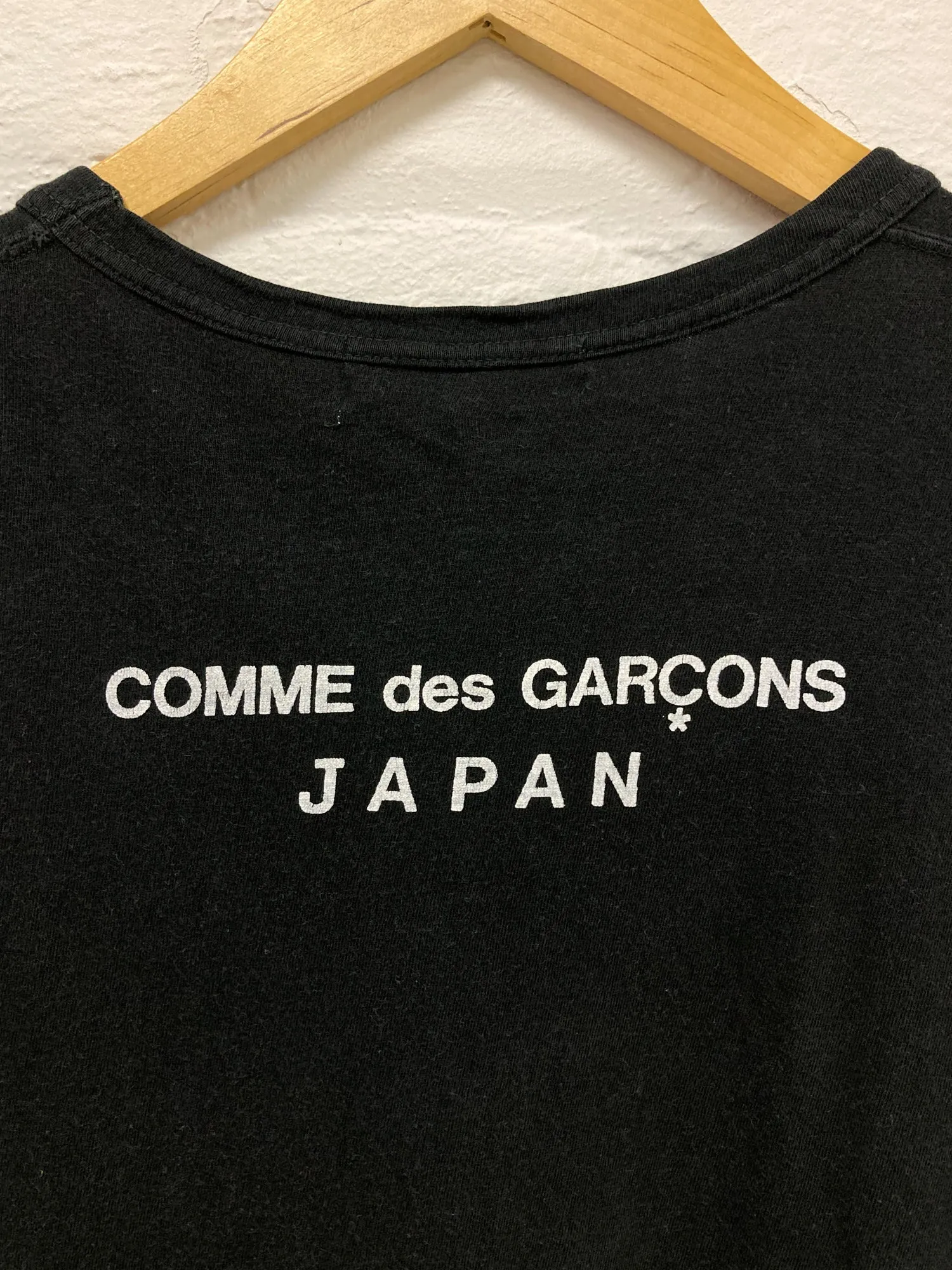 Comme des Garcons 1980s faded black cotton jersey 'CDG JAPAN' back print tshirt